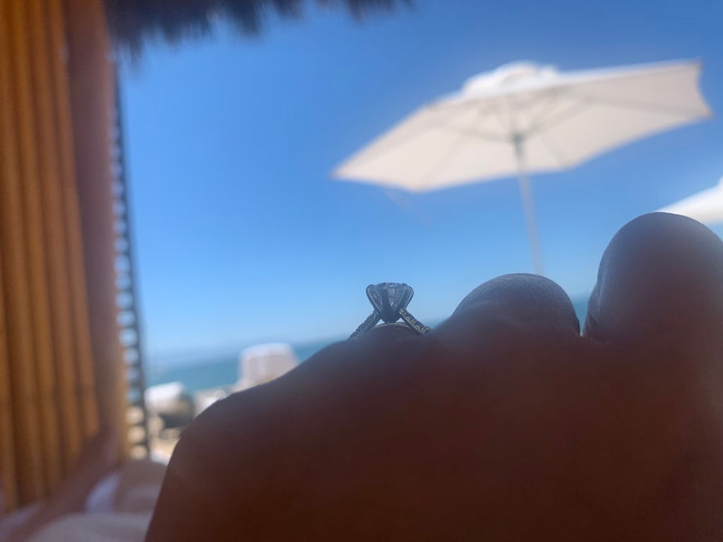 Oval diamond ring on hand