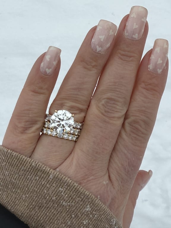 Oval diamond ring on hand