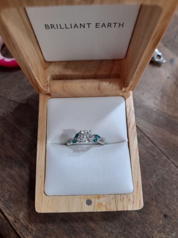 Oval diamond ring on hand
