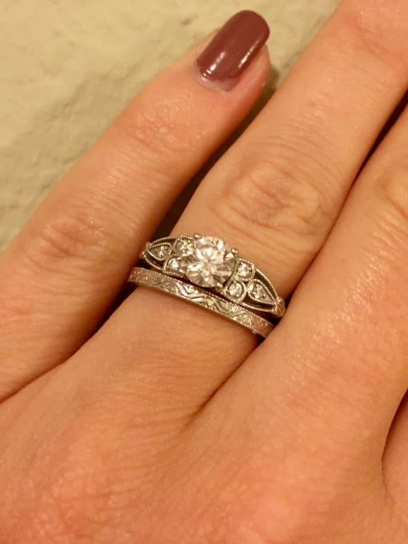 Oval diamond ring on hand