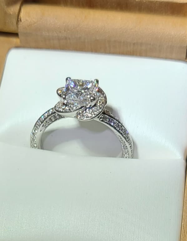 Oval diamond ring on hand