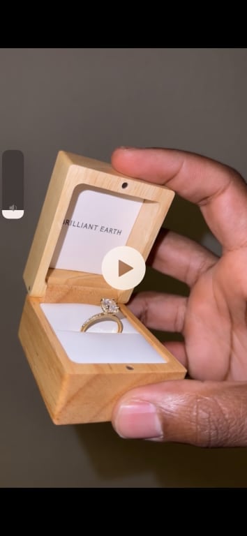 Oval diamond ring on hand