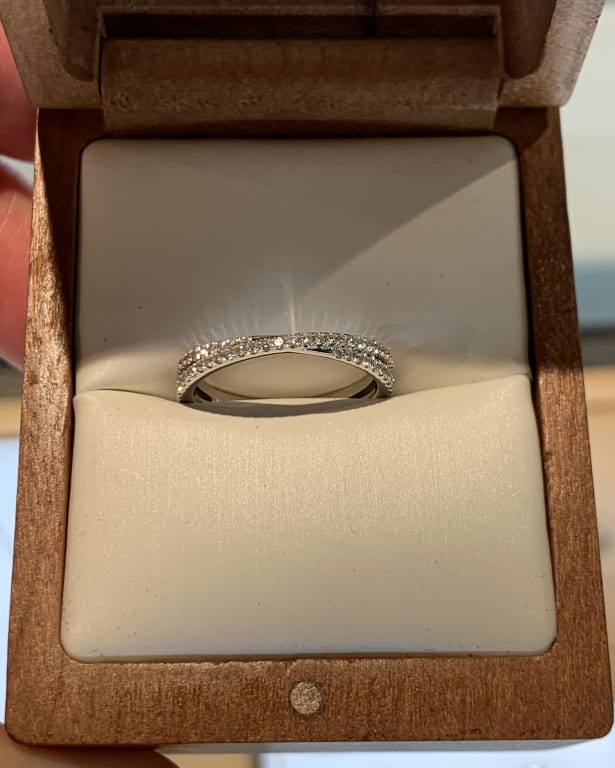 Oval diamond ring on hand