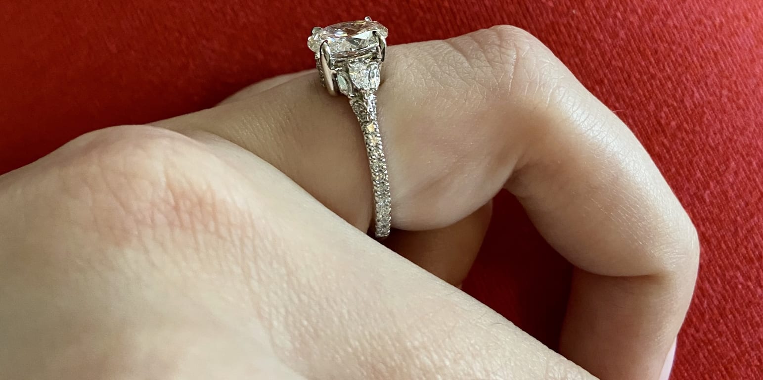 Oval diamond ring on hand