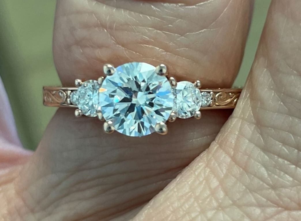 Oval diamond ring on hand