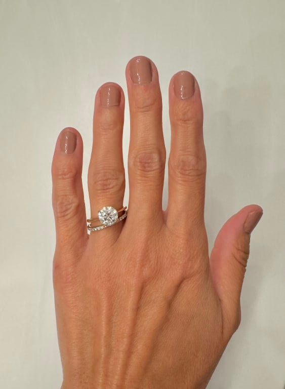 Oval diamond ring on hand