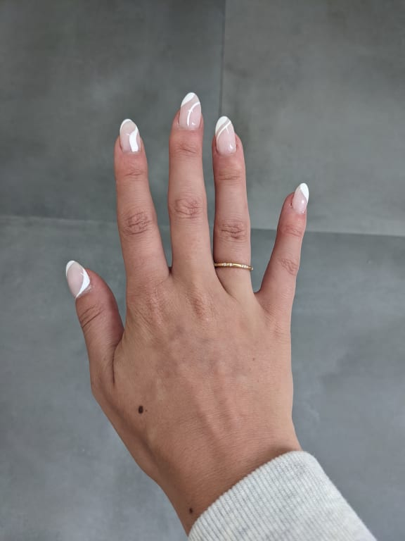 Oval diamond ring on hand