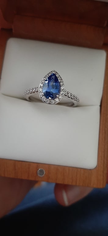 Oval diamond ring on hand