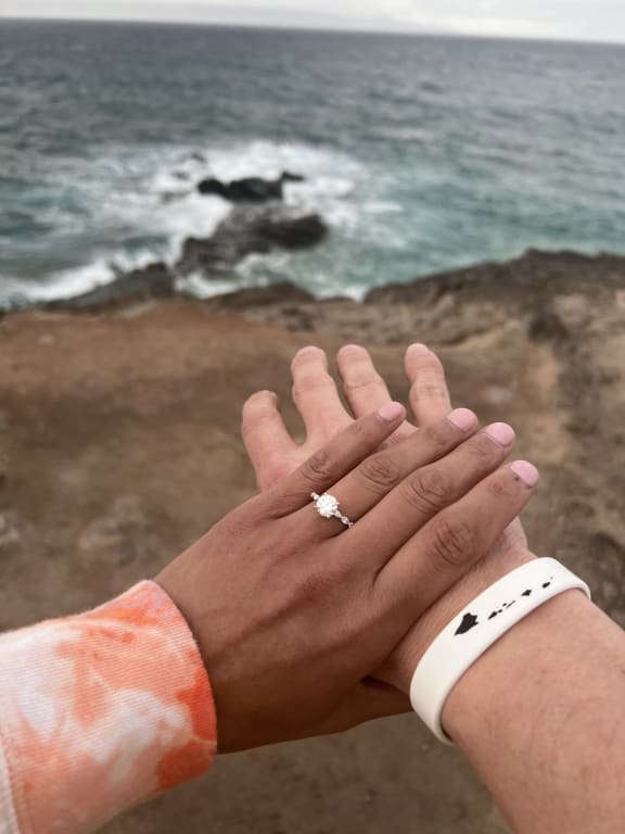 Oval diamond ring on hand