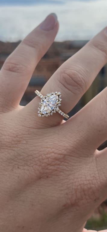 Oval diamond ring on hand