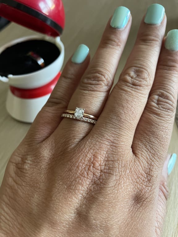Oval diamond ring on hand