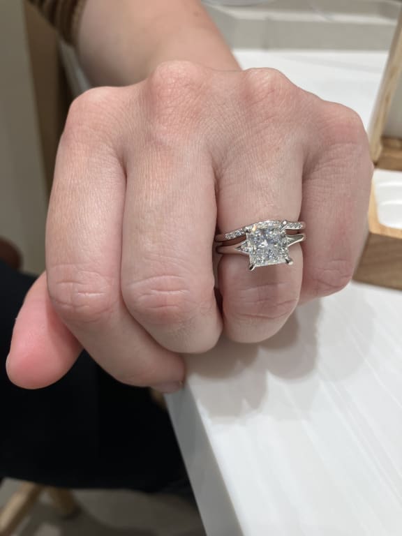 Oval diamond ring on hand