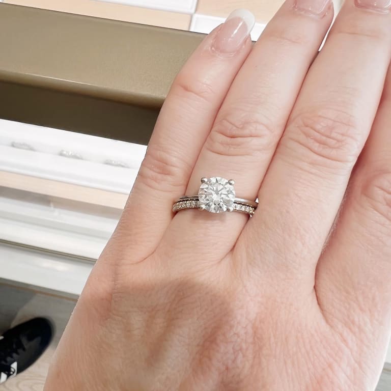 Oval diamond ring on hand