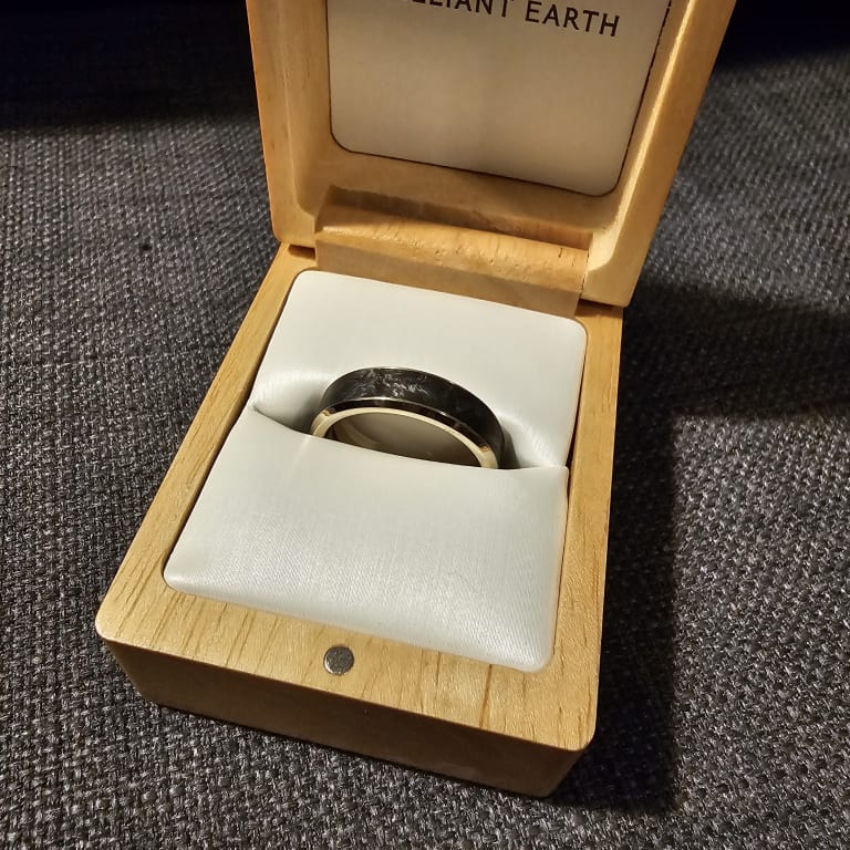 Oval diamond ring on hand