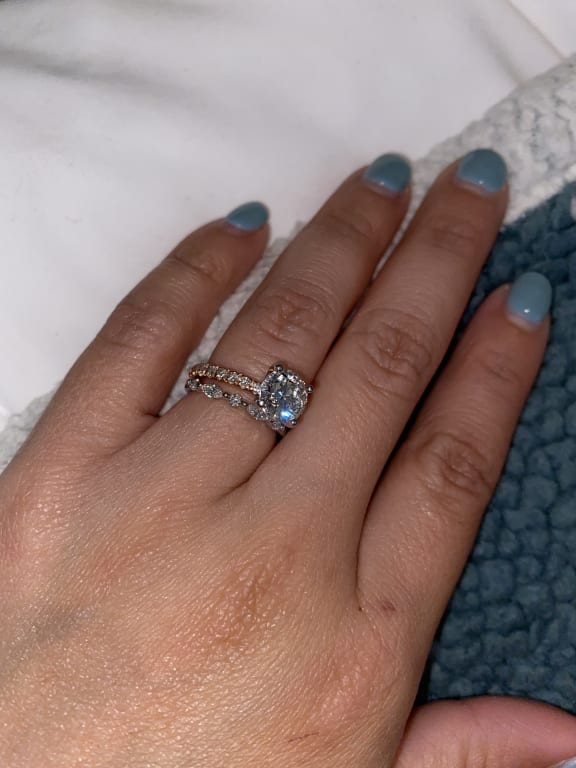 Oval diamond ring on hand