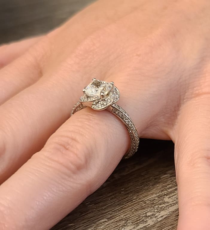 Oval diamond ring on hand