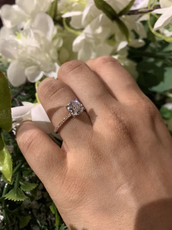 Oval diamond ring on hand