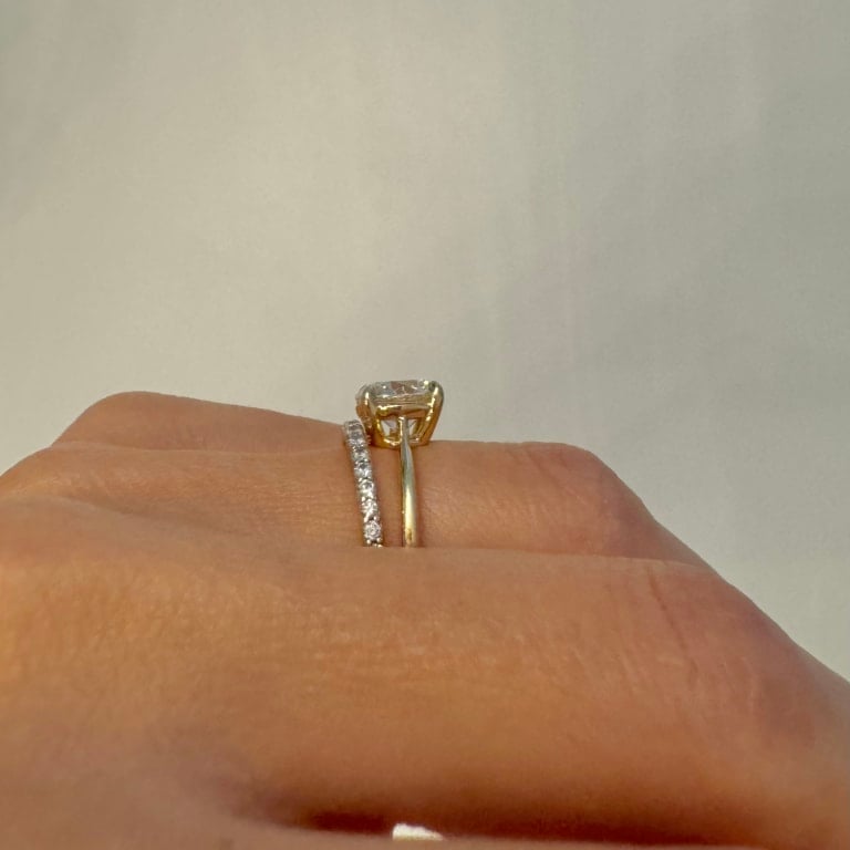 Oval diamond ring on hand
