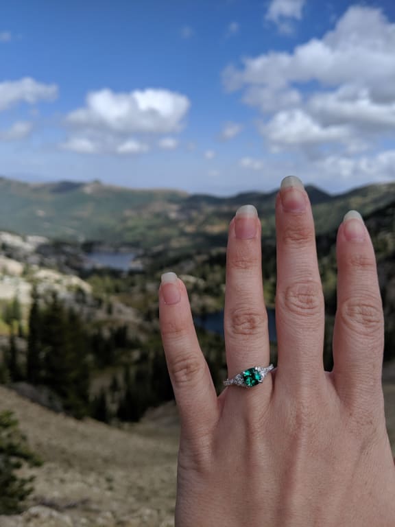 Oval diamond ring on hand