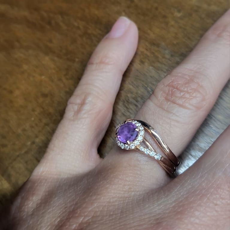 Oval diamond ring on hand