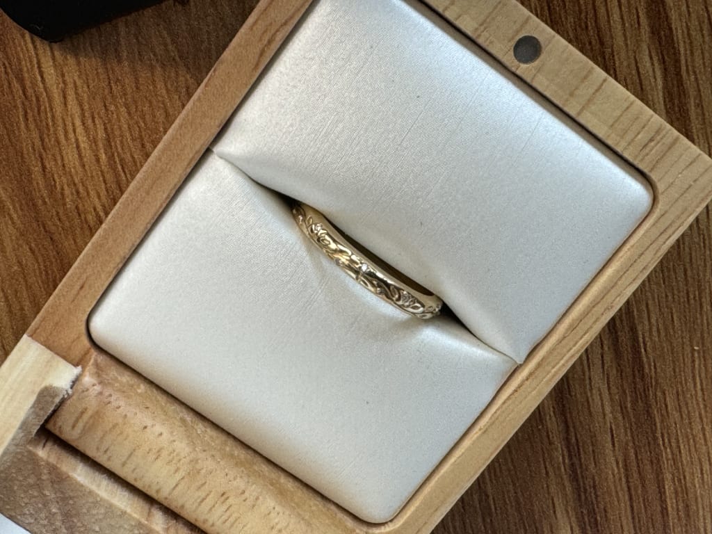Oval diamond ring on hand