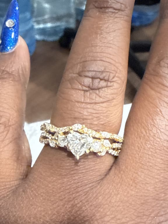 Oval diamond ring on hand
