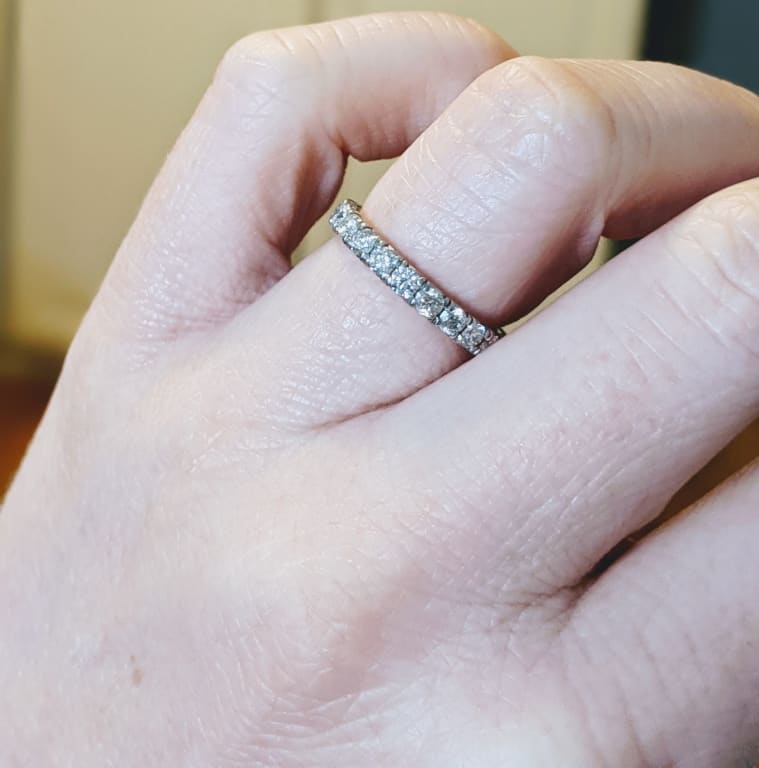 Oval diamond ring on hand