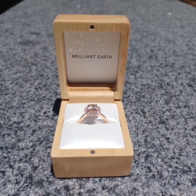 Oval diamond ring on hand