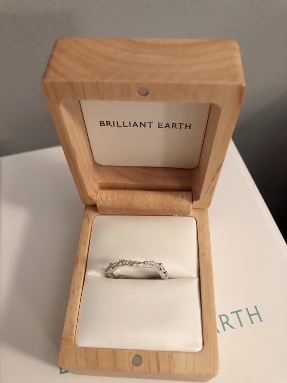 Oval diamond ring on hand