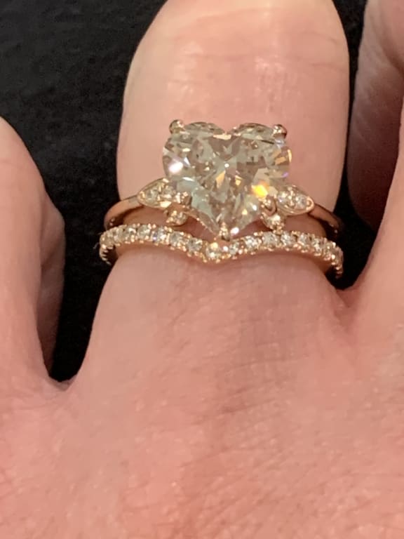 Oval diamond ring on hand