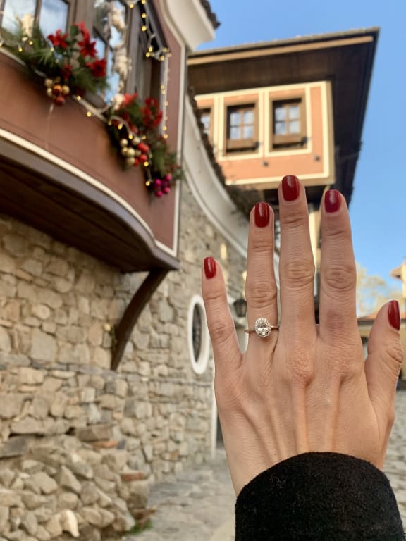 Oval diamond ring on hand