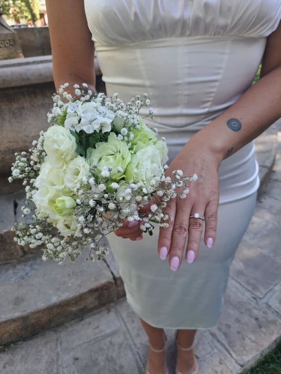 Oval diamond ring on hand