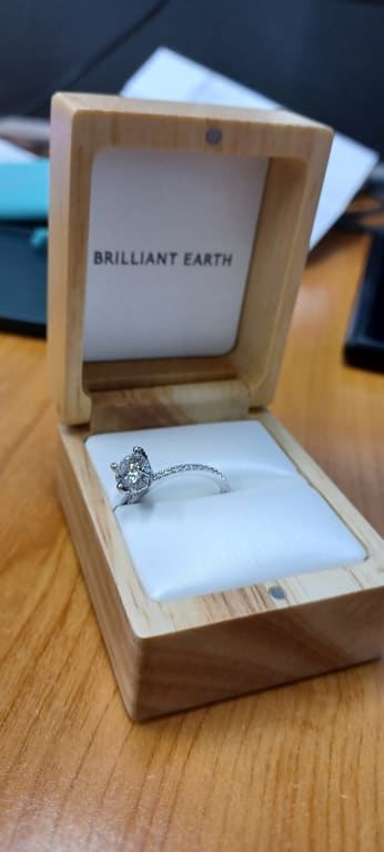 Oval diamond ring on hand