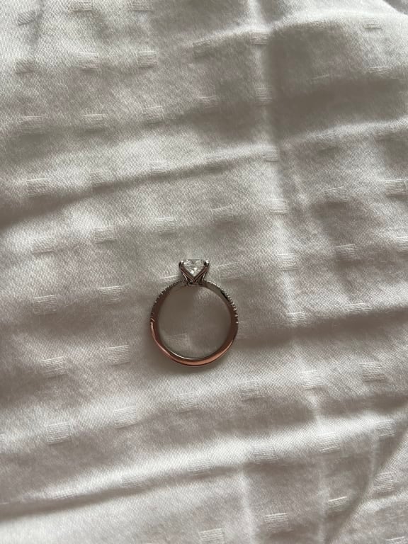 Oval diamond ring on hand