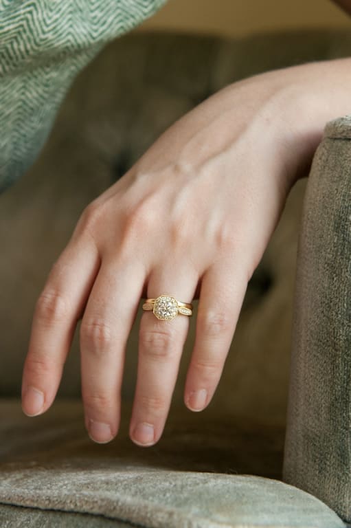 Oval diamond ring on hand