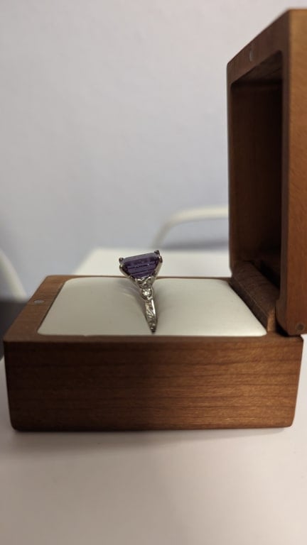 Oval diamond ring on hand