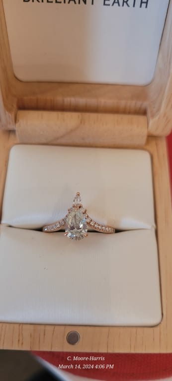 Oval diamond ring on hand