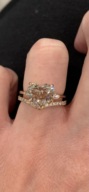 Oval diamond ring on hand