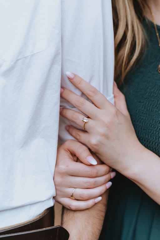 Oval diamond ring on hand