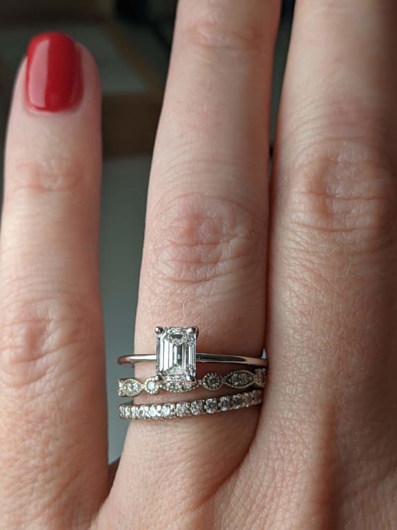 Oval diamond ring on hand