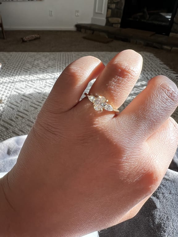 Oval diamond ring on hand