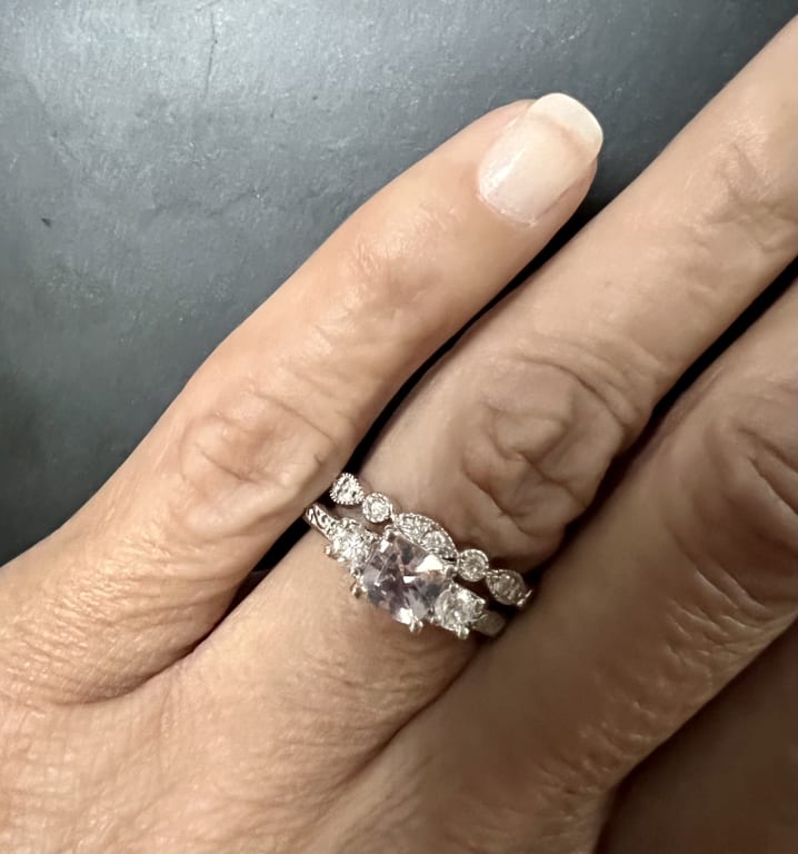 Oval diamond ring on hand