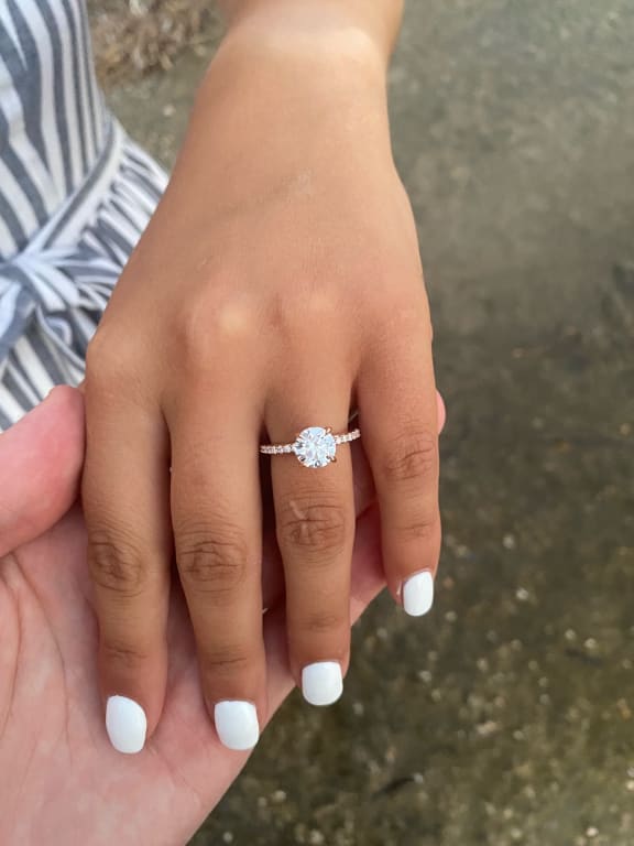 Oval diamond ring on hand