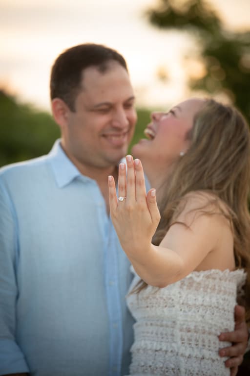 Oval diamond ring on hand