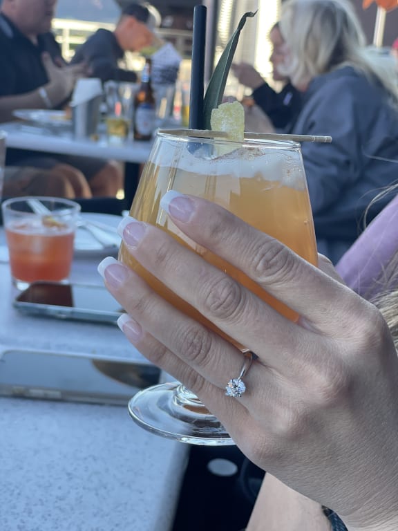 Oval diamond ring on hand