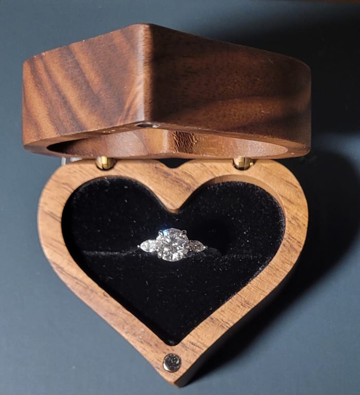 Oval diamond ring on hand