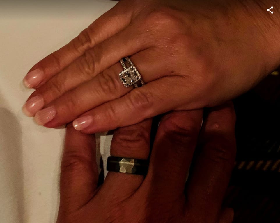 Oval diamond ring on hand