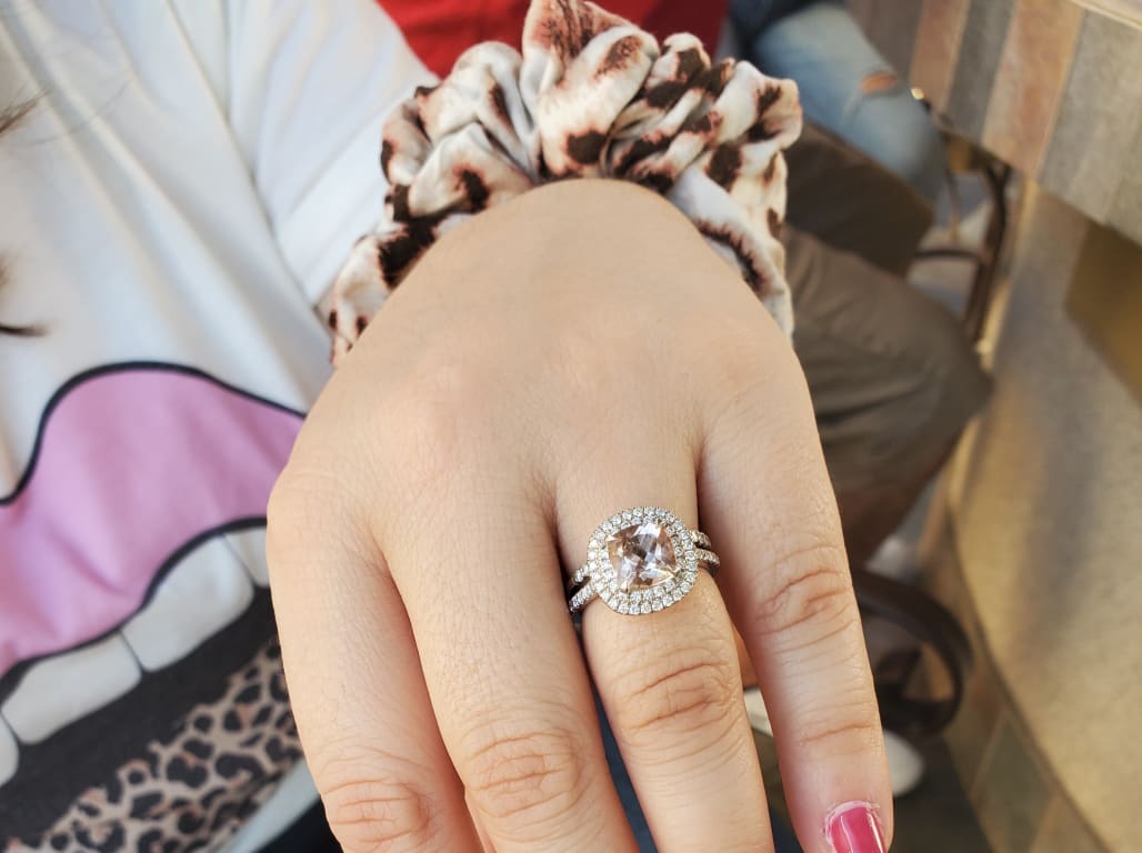 Oval diamond ring on hand