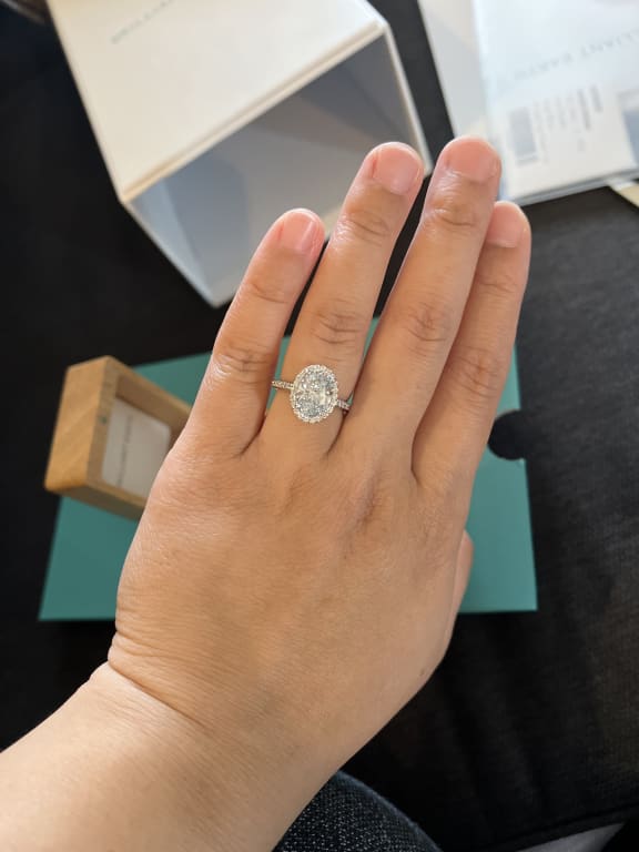 Oval diamond ring on hand