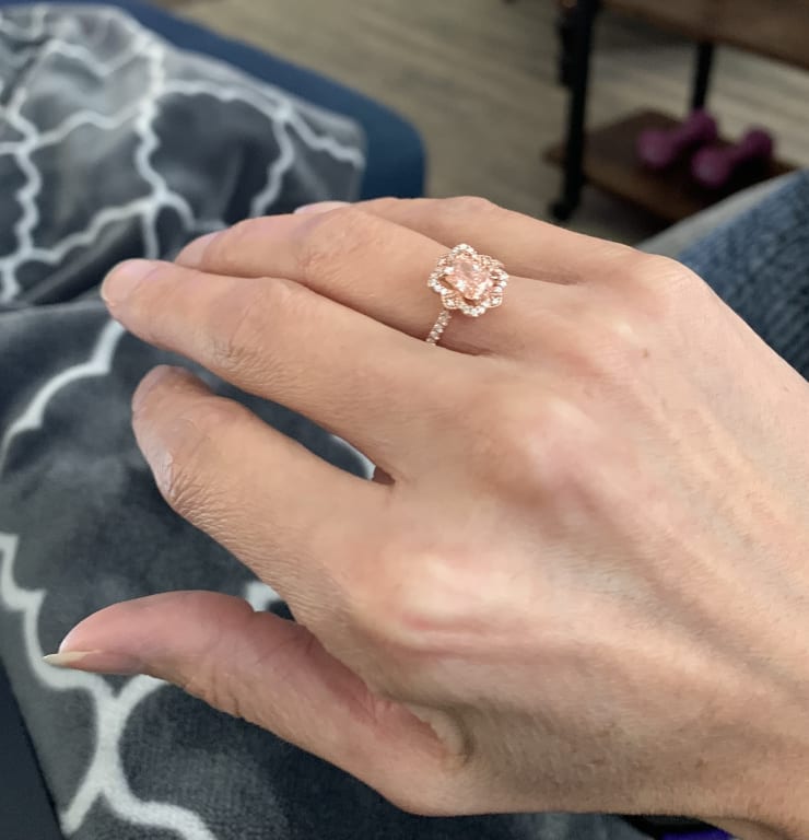 Oval diamond ring on hand